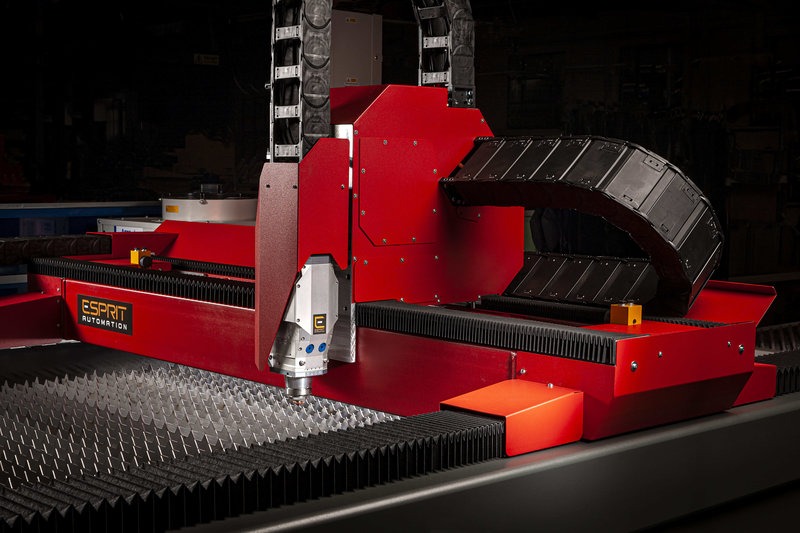 Photon 5G Fiber Laser Cutting Head, Linear Drive Motors and Gantry  installing a new machine at a customer together with an operator